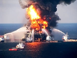 A Coast Guard MH-65C dolphin rescue helicopter and crew document the fire aboard the mobile ...
© United States Coast Guard
© United States Coast Guard